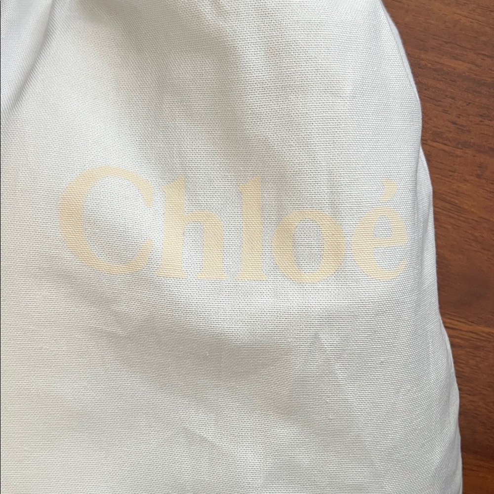 Chloe White Slip-On Sneakers - Picture 9 of 9
